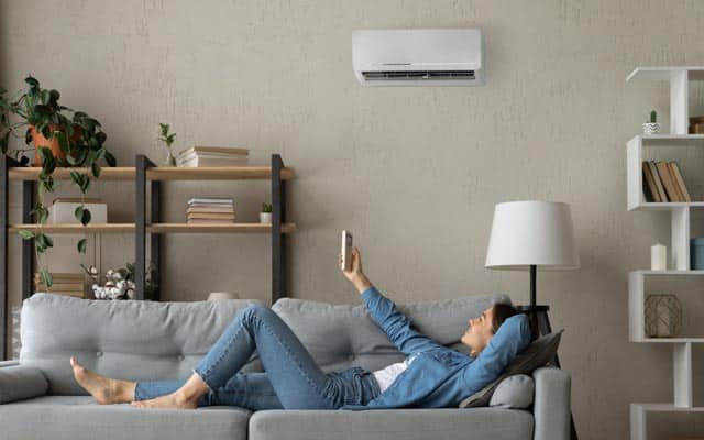 Jersey Heat and Air Comprehensive HVAC Maintenance Plans, Experienced HVAC professional evaluating system efficiency and recommending cost-effective service options
