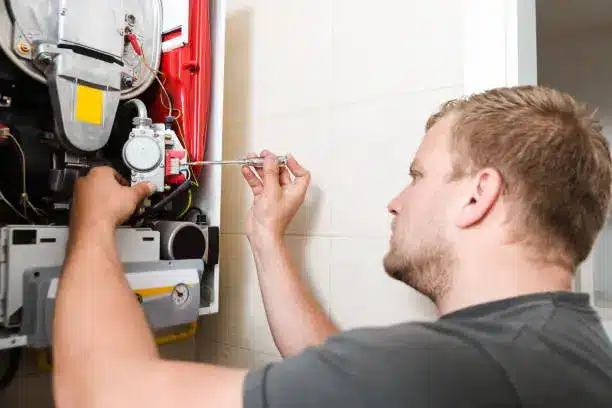 Skilled technician testing heater components to restore safe winter performance